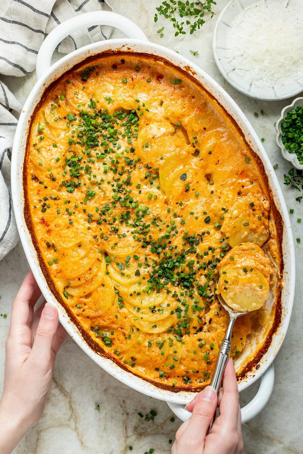 Deliciously lighter scalloped potatoes served as a holiday side dish